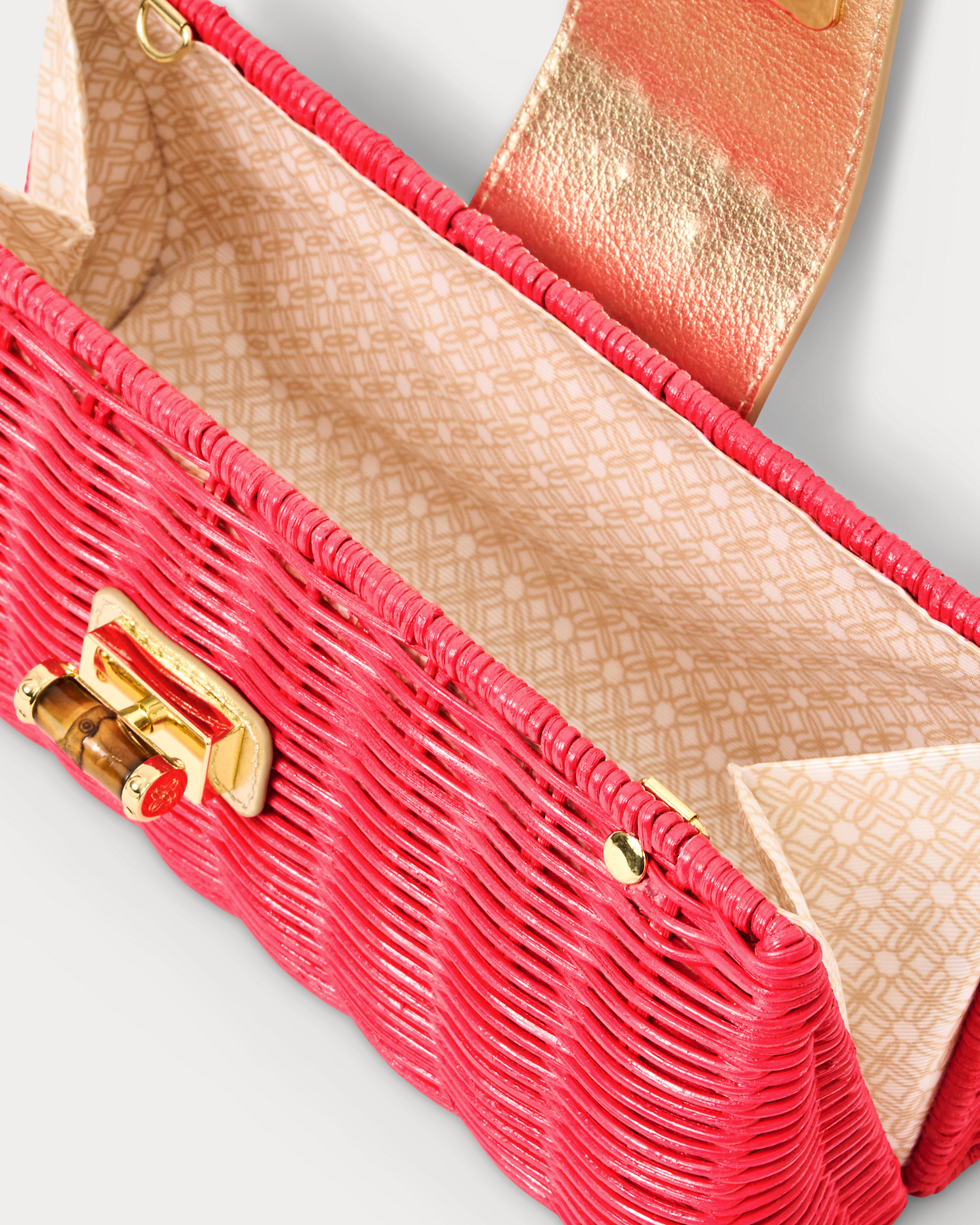 LEENA WICKER CLUTCH